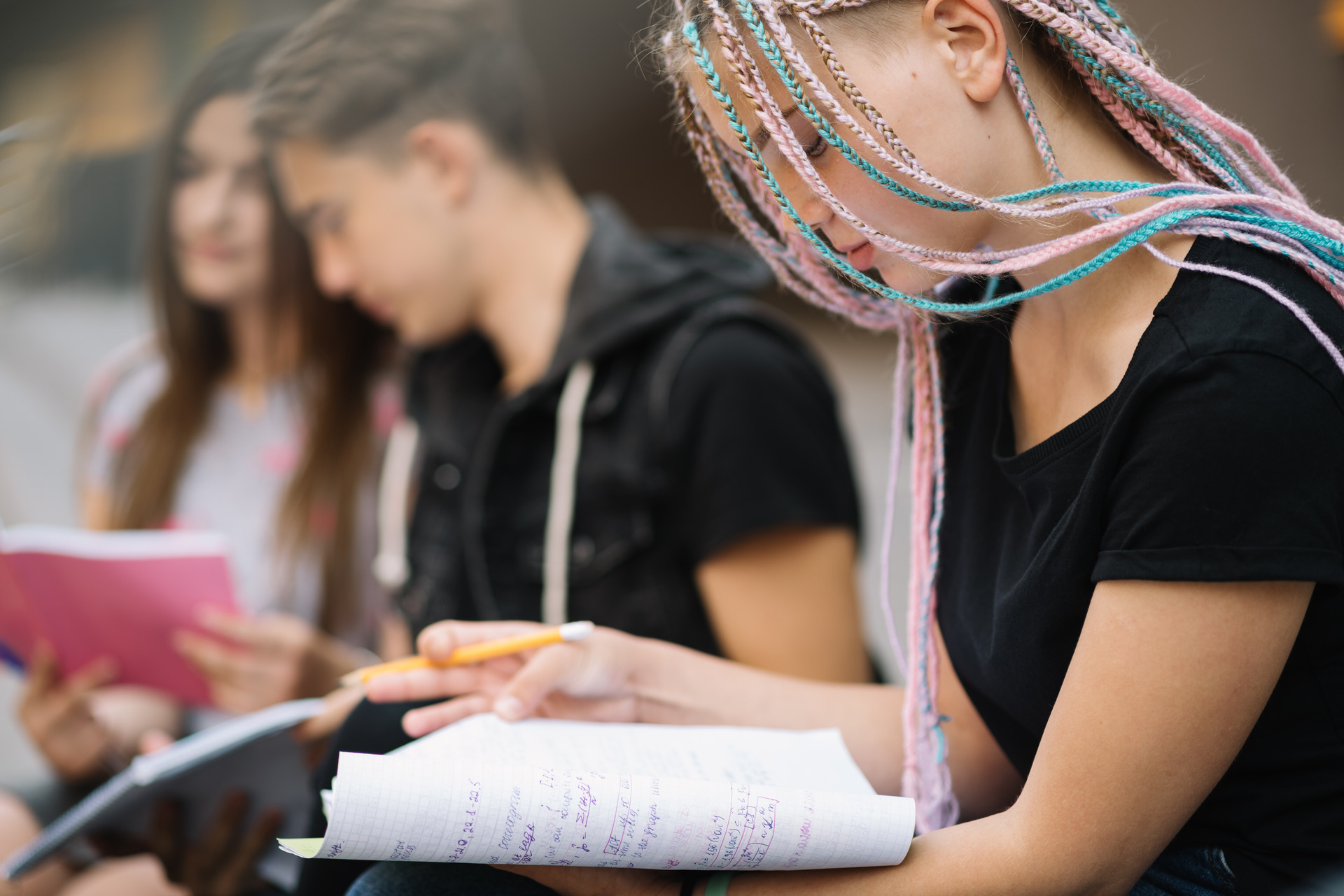 girl-with-friends-posing-with-books(1)